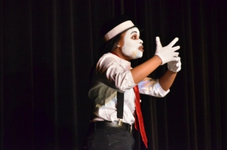 A group of students came together to perform an interpretive dance by miming. Photo by Carlo Nasisse.
