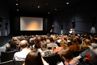 People gather at Cine in downtown Athens for the viewing of the commercials and a documentary concerning the water crisis. Photo by Porter McLeod.
