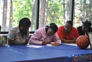Senior Cierra Jackson signs her official letter of intent to play basketball at North Georgia College and State University in Dahlonega, Ga. Photo by Porter McLeod.