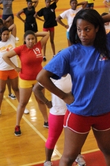 Former CCHS varsity cheerleader class of 2006 Brandi Gilbert teaches girls trying out a chant and a cheer. They will be expected to perform one individually, which will decide their spot on next year's squad.