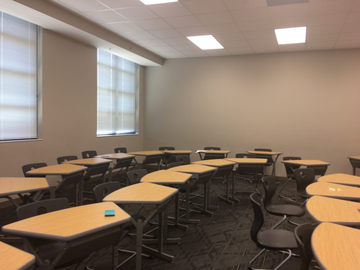 Empty chairs at empty tables